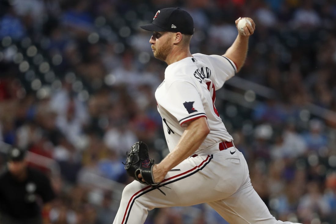 Jun 2, 2023; Minneapolis, Minnesota, USA; Minnesota Twins relief pitcher Brock Stewart (61) throws to the Cleveland Guardians in the seventh inning at Target Field. Mandatory Credit: Bruce Kluckhohn-USA TODAY Sports