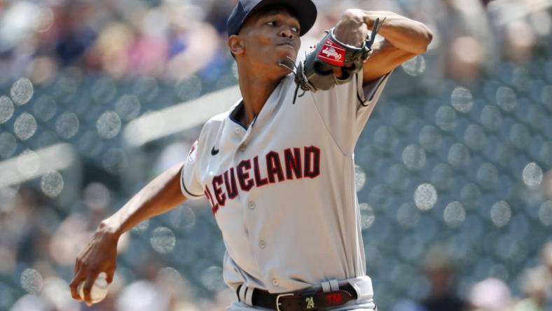 Jun 4, 2023; Minneapolis, Minnesota, USA; Cleveland Guardians starting pitcher Triston McKenzie (24) throws to the Minnesota Twins in the second inning at Target Field. Mandatory Credit: Bruce Kluckhohn-USA TODAY Sports