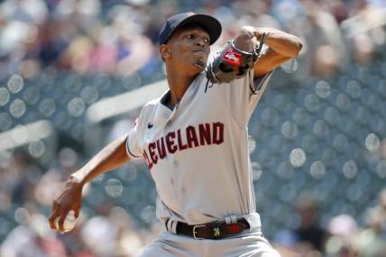 Jun 4, 2023; Minneapolis, Minnesota, USA; Cleveland Guardians starting pitcher Triston McKenzie (24) throws to the Minnesota Twins in the second inning at Target Field. Mandatory Credit: Bruce Kluckhohn-USA TODAY Sports