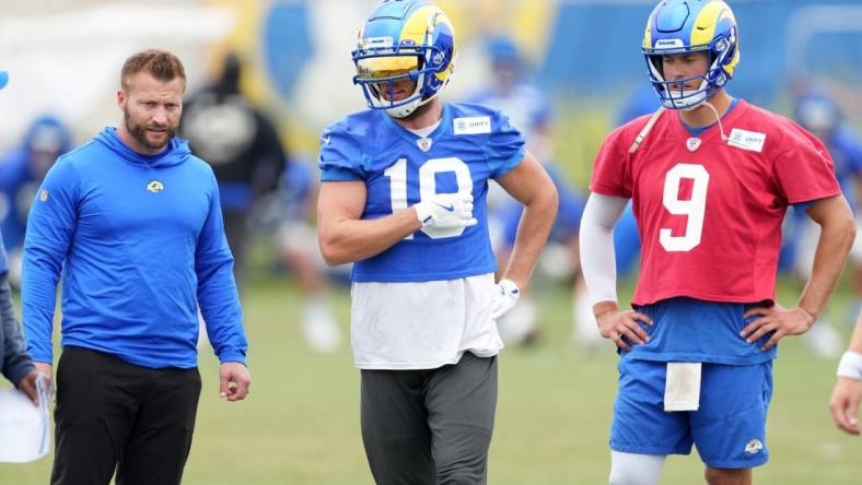 Jun 14, 2023; Thousand Oaks, CA, USA; Los Angeles Rams coach Sean McVay (left), receiver Cooper Kupp (10) and quarterback Matthew Stafford (9) during minicamp at Cal Lutheran University. Mandatory Credit: Kirby Lee-USA TODAY Sports