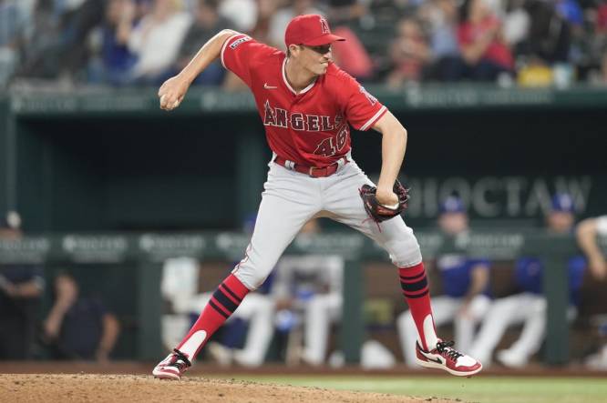 Jun 14, 2023; Arlington, Texas, USA; Los Angeles Angels relief pitcher Jimmy Herget (46) delivers a pitch to the Texas Rangers during the seventh inning at Globe Life Field. Mandatory Credit: Jim Cowsert-USA TODAY Sports