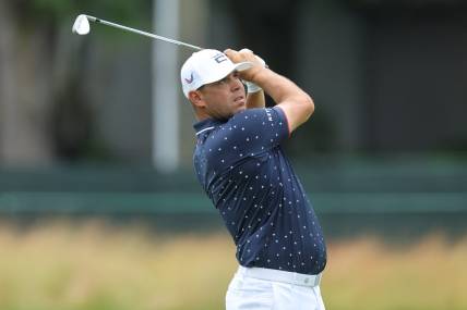 Jun 24, 2023; Cromwell, Connecticut, USA; Gary Woodland plays his shot on the seventh hole during the third round of the Travelers Championship golf tournament. Mandatory Credit: Vincent Carchietta-USA TODAY Sports