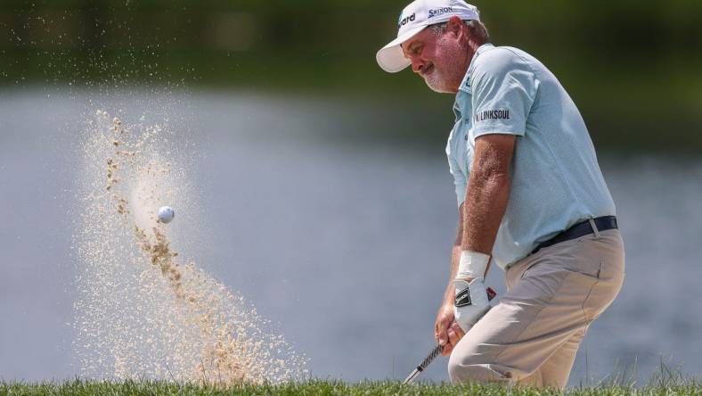 Jerry Kelly pitches out of a greenside bunker on the 12th hole during the final round of the 2023 U.S. Senior Open on Sunday, July 2, 2023, at SentryWorld in Stevens Point, Wis. Kelly finished the tournament in 3rd place at 4-under par.Tork Mason/USA TODAY NETWORK-Wisconsin