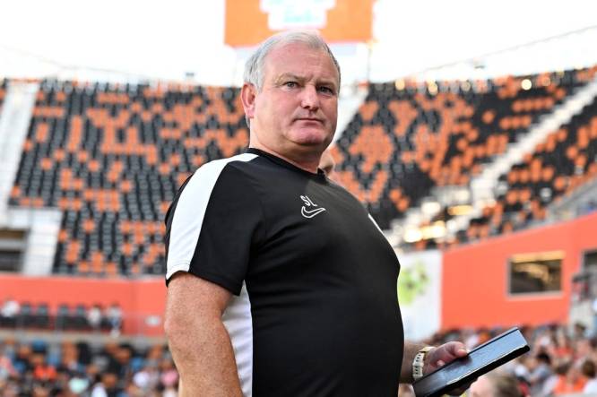 Jul 7, 2023; Houston, Texas, USA; Houston Dash head coach Sam Laity looks on before the game against the Chicago Red Stars at Shell Energy Stadium. Mandatory Credit: Maria Lysaker-USA TODAY Sports