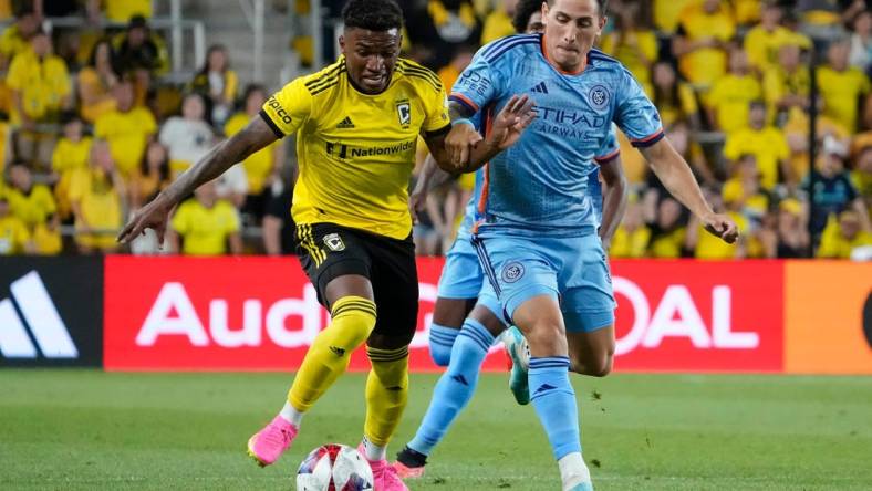 Jul 8, 2023; Columbus, Ohio, USA;  Columbus Crew midfielder Luis Diaz (11) runs past New York City FC defender Braian Cufre (3) during the second half of the MLS soccer match at Lower.com Field. Diaz was brought down by Cufre on the play but no foul was called, resulting in Columbus Crew head coach Wilfried Nancy being given a red card for his protest. The Crew tied 1-1.