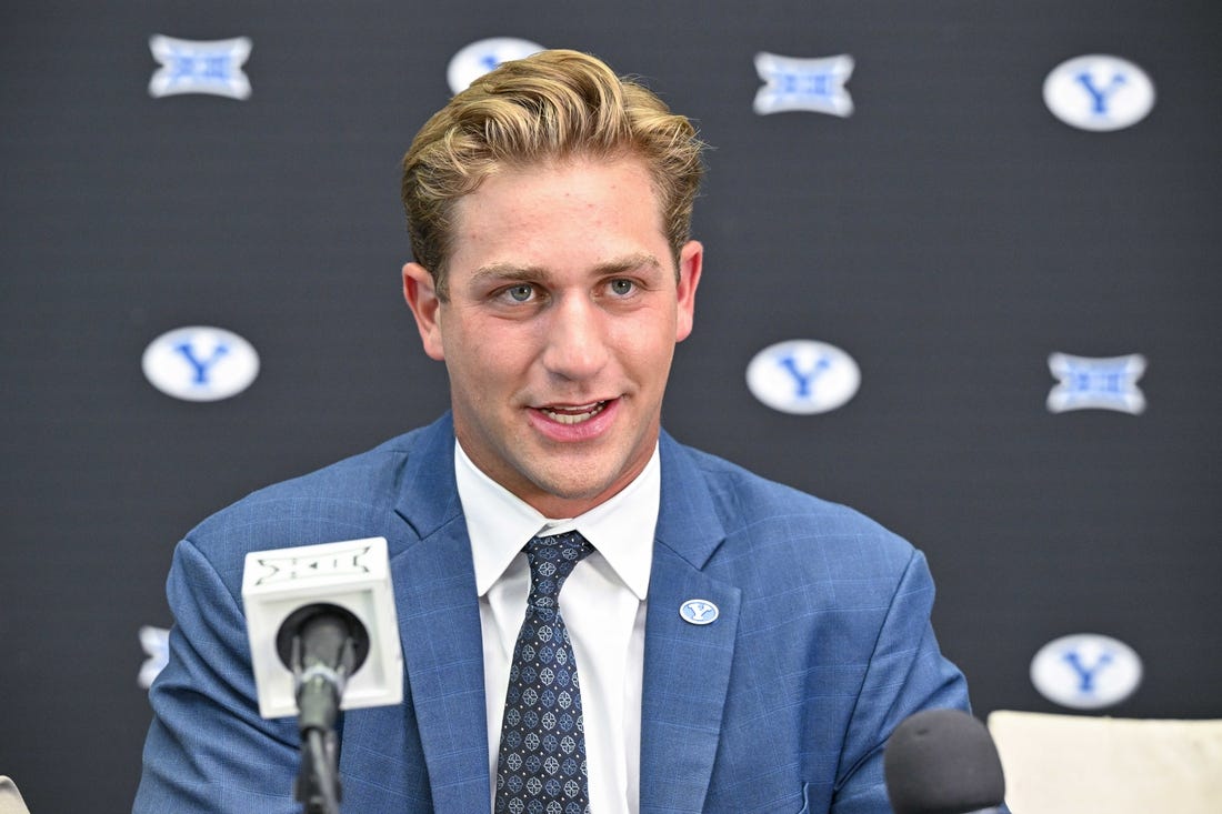 Jul 12, 2023; Arlington, TX, USA; BYU Cougars quarterback Kedon Slovis is interviewed during Big 12 football media day at AT&T Stadium. Mandatory Credit: Jerome Miron-USA TODAY Sports