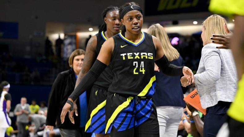 Jul 22, 2023; Arlington, Texas, USA; Dallas Wings guard Arike Ogunbowale (24) leaves the game against the Los Angeles Sparks during the second half at College Park Center. Mandatory Credit: Jerome Miron-USA TODAY Sports