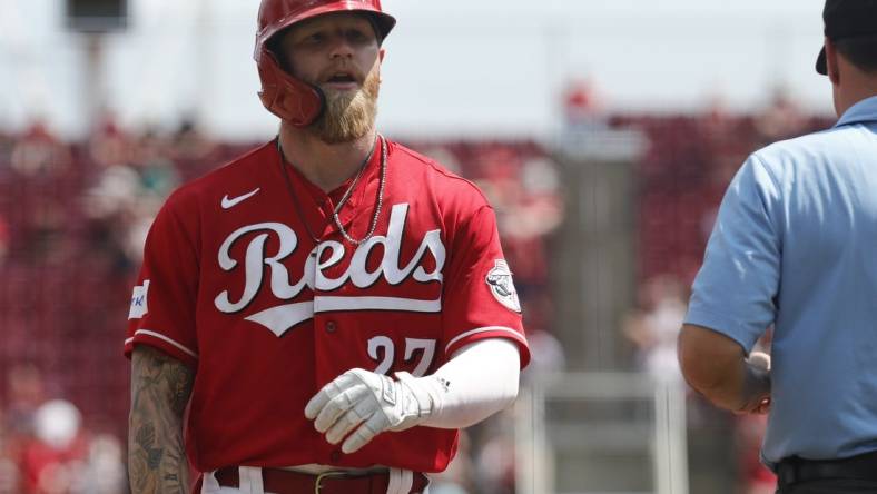 Jul 23, 2023; Cincinnati, Ohio, USA; Cincinnati Reds center fielder Jake Fraley (27) walks from third base after being tagged out against the Arizona Diamondbacks during the sixth inning at Great American Ball Park. Mandatory Credit: David Kohl-USA TODAY Sports