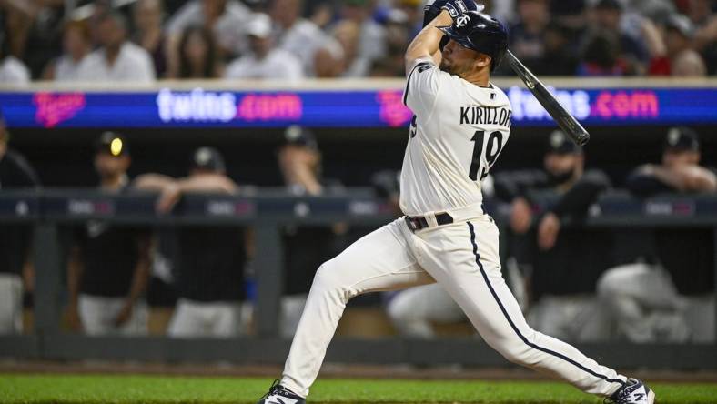 Jul 24, 2023; Minneapolis, Minnesota, USA;  Minnesota Twins infielder Alex Kirilloff (19) hits a double against the Seattle Mariners during the ninth inning at Target Field. Mandatory Credit: Nick Wosika-USA TODAY Sports