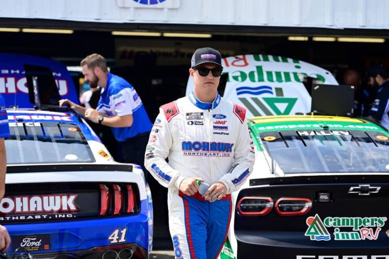 Jul 15, 2023; Loudon, New Hampshire, USA; NASCAR Cup Series driver Ryan Preece (41) walks through the garage area prior to qualifying for the Crayon 301 at New Hampshire Motor Speedway. Mandatory Credit: Eric Canha-USA TODAY Sports