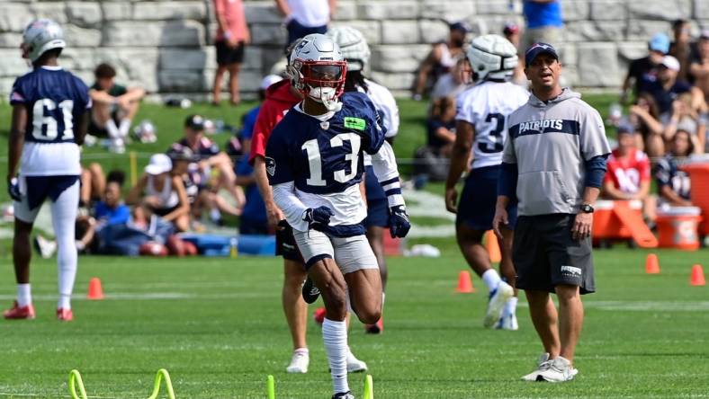 Jul 27, 2023; Foxborough, MA, USA; New England Patriots cornerback Jack Jones (13) sprints during training camp at Gillette Stadium. Mandatory Credit: Eric Canha-USA TODAY Sports