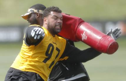 Jul 27, 2023; Latrobe, PA, USA;  Pittsburgh Steelers defensive tackle Cameron Heyward (97) participates in drills during training camp at Saint Vincent College. Mandatory Credit: Charles LeClaire-USA TODAY Sports
