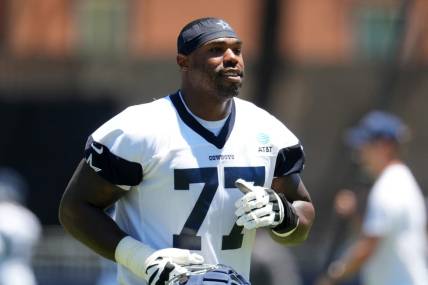 Jul 27, 2023; Oxnard, CA, USA; Dallas Cowboys tackle Tyron Smith (77) during training camp at Marriott Residence Inn-River Ridge Playing Fields. Mandatory Credit: Kirby Lee-USA TODAY Sports