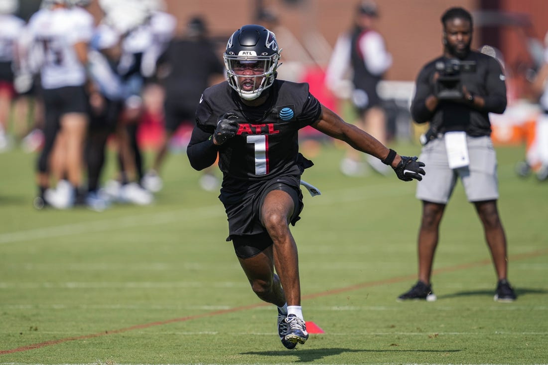 Jul 28, 2023; Flowery Branch, GA, USA; Atlanta Falcons cornerback Jeff Okudah (1)  runs during a drill during training camp at IBM Performance Field. Mandatory Credit: Dale Zanine-USA TODAY Sports