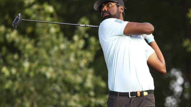 Jul 28, 2023; Blaine, Minnesota, USA; Sahith Theegala hits his tee shot on the 11th hole during the second round of the 3M Open golf tournament. Mandatory Credit: Matt Krohn-USA TODAY Sports