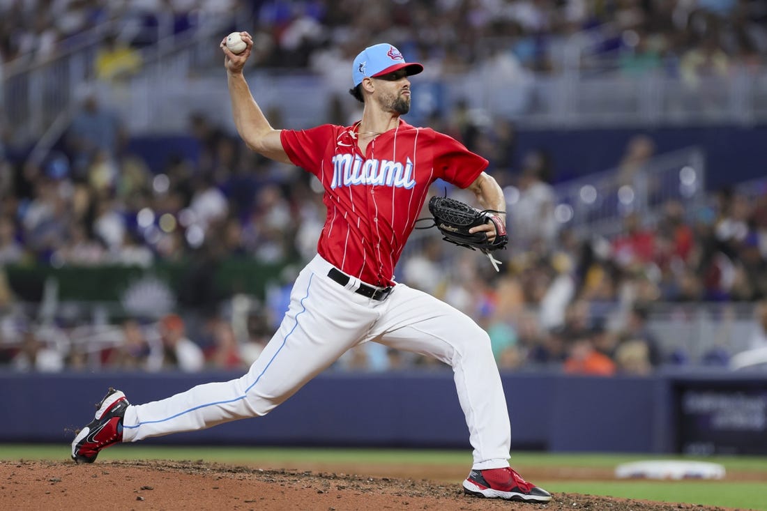 Jul 29, 2023; Miami, Florida, USA; Miami Marlins relief pitcher Jorge Lopez (52) delivers a pitch against the Detroit Tigers during the eighth inning at loanDepot Park. Mandatory Credit: Sam Navarro-USA TODAY Sports