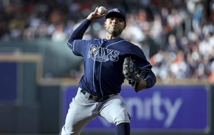 Jul 29, 2023; Houston, Texas, USA; Tampa Bay Rays starting pitcher Taj Bradley (45) delivers a pitch during the second inning against the Houston Astros at Minute Maid Park. Mandatory Credit: Troy Taormina-USA TODAY Sports