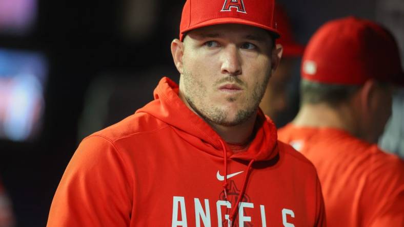 Aug 1, 2023; Atlanta, Georgia, USA; Los Angeles Angels outfielder Mike Trout (27) in the dugout against the Atlanta Braves in the seventh inning at Truist Park. Mandatory Credit: Brett Davis-USA TODAY Sports