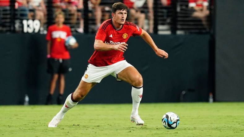 Jul 30, 2023; Las Vegas, Nevada, USA;  Manchester United defender Harry Maguire (5) moves the ball during the first half against Borussia Dortmund at Allegiant Stadium. Mandatory Credit: Lucas Peltier-USA TODAY Sports