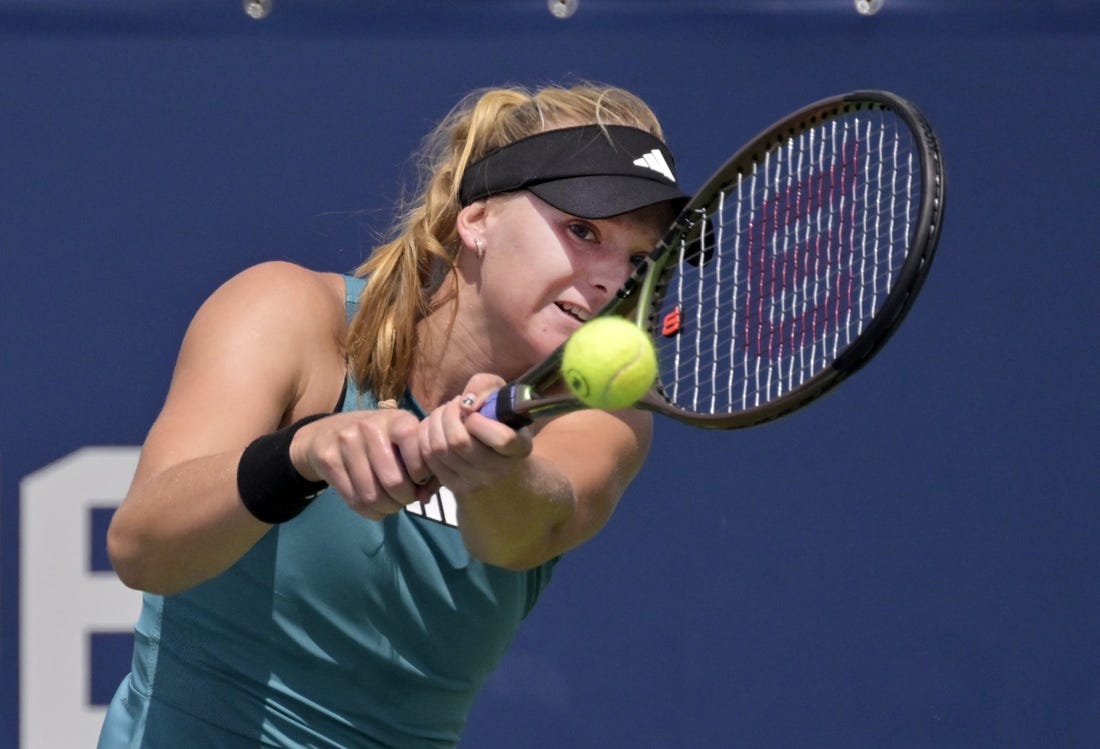 Aug 5, 2023; Montreal, Quebec, Canada; Ashlyn Krueger (USA) hits a backhand against Mirjam Bjorklund (SWE) (not pictured) in first round qualifying play at IGA Stadium. Mandatory Credit: Eric Bolte-USA TODAY Sports