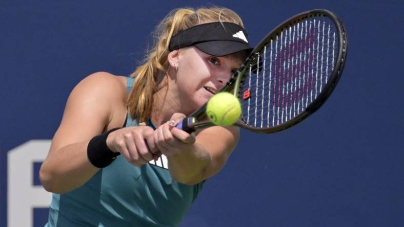 Aug 5, 2023; Montreal, Quebec, Canada; Ashlyn Krueger (USA) hits a backhand against Mirjam Bjorklund (SWE) (not pictured) in first round qualifying play at IGA Stadium. Mandatory Credit: Eric Bolte-USA TODAY Sports