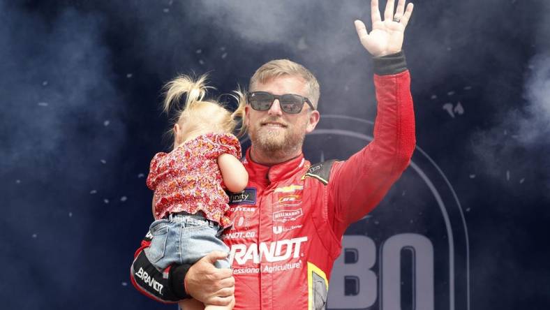 Aug 5, 2023; Brooklyn, Michigan, USA; Xfinity Series driver Justin Allgaier (7) during driver introductions before the Cabo Wabo 250 at Michigan International Speedway. Mandatory Credit: Mike Dinovo-USA TODAY Sports