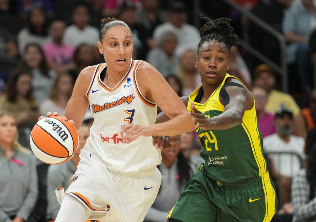 Aug 5, 2023; Phoenix, Arizona, USA; Phoenix Mercury guard Diana Taurasi (3) dribbles against Seattle Storm guard Jewell Loyd (24) during the first half at Footprint Center. Mandatory Credit: Joe Camporeale-USA TODAY Sports