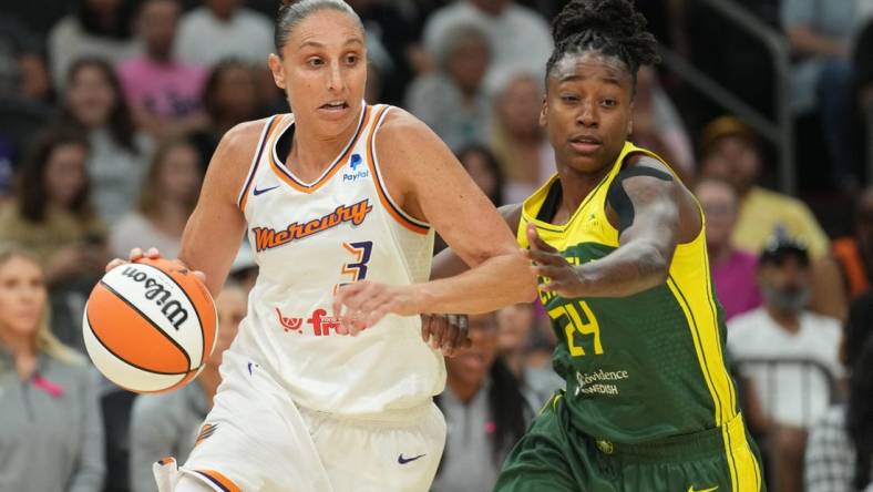 Aug 5, 2023; Phoenix, Arizona, USA; Phoenix Mercury guard Diana Taurasi (3) dribbles against Seattle Storm guard Jewell Loyd (24) during the first half at Footprint Center. Mandatory Credit: Joe Camporeale-USA TODAY Sports