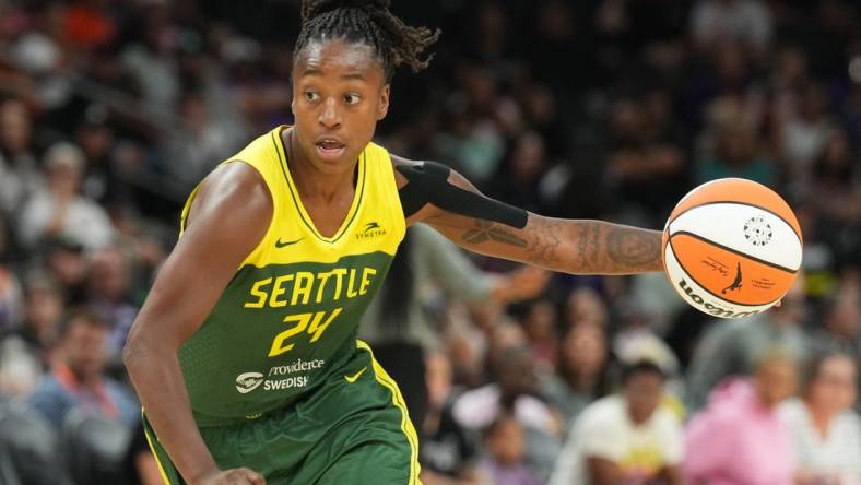 Aug 5, 2023; Phoenix, Arizona, USA; Seattle Storm guard Jewell Loyd (24) dribbles against the Phoenix Mercury during the second half at Footprint Center. Mandatory Credit: Joe Camporeale-USA TODAY Sports