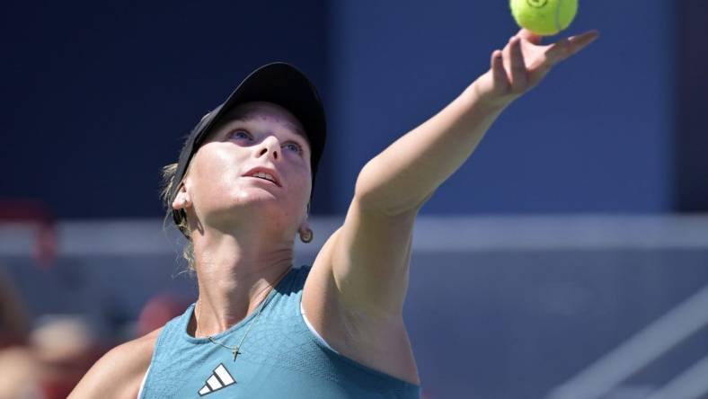 Aug 6, 2023; Montreal, Quebec, Canada; Ashlyn Krueger (USA) serves against Camila Giorgi (ITA) (not pictured) in second round qualifying play at IGA Stadium. Mandatory Credit: Eric Bolte-USA TODAY Sports