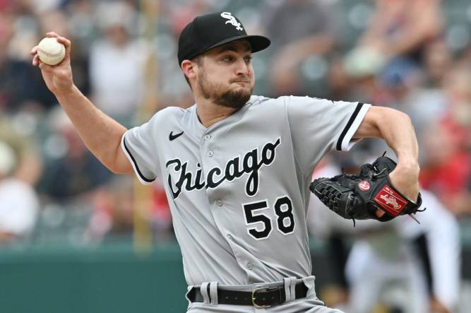 Aug 6, 2023; Cleveland, Ohio, USA; Chicago White Sox relief pitcher Jimmy Lambert (58) throws a pitch during the ninth inning against the Cleveland Guardians at Progressive Field. Mandatory Credit: Ken Blaze-USA TODAY Sports