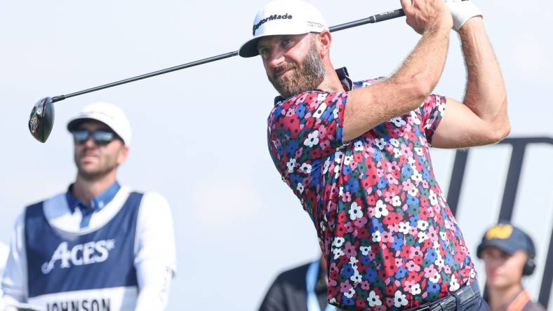 Aug 11, 2023; Bedminster, New Jersey, USA; Dustin Johnson plays his shot from the first tee during the first round of the LIV Golf Bedminster golf tournament at Trump National Bedminster. Mandatory Credit: Vincent Carchietta-USA TODAY Sports