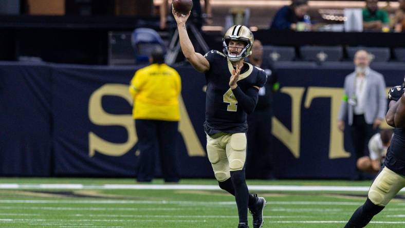 Aug 13, 2023; New Orleans, Louisiana, USA; New Orleans Saints quarterback Derek Carr (4) passes against the Kansas City Chiefs during the first half at the Caesars Superdome. Mandatory Credit: Stephen Lew-USA TODAY Sports