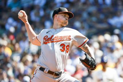 Aug 13, 2023; Seattle, Washington, USA; Baltimore Orioles starting pitcher Kyle Bradish (39) throws against the Seattle Mariners during the third inning at T-Mobile Park. Mandatory Credit: Joe Nicholson-USA TODAY Sports