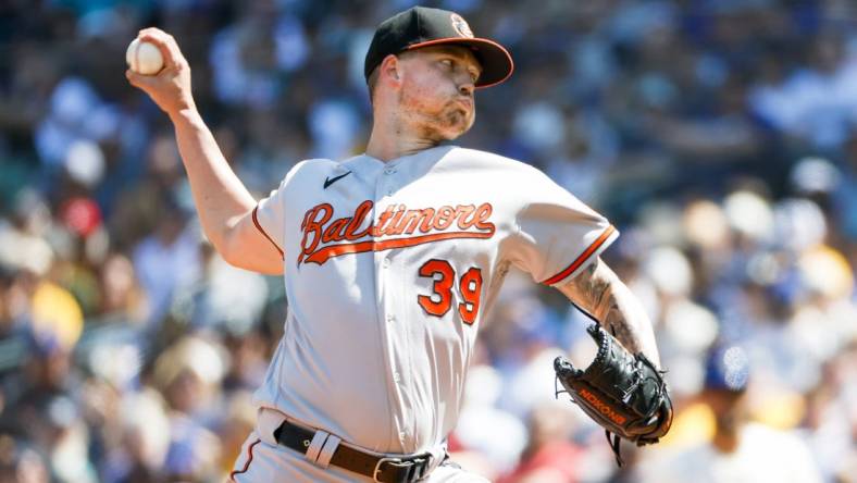 Aug 13, 2023; Seattle, Washington, USA; Baltimore Orioles starting pitcher Kyle Bradish (39) throws against the Seattle Mariners during the third inning at T-Mobile Park. Mandatory Credit: Joe Nicholson-USA TODAY Sports