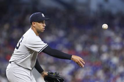 Aug 13, 2023; Miami, Florida, USA; New York Yankees relief pitcher Keynan Middleton (93) tosses the baseball to first base and retires Miami Marlins right fielder Jesus Sanchez (not pictured) during the eighth inning at loanDepot Park. Mandatory Credit: Sam Navarro-USA TODAY Sports