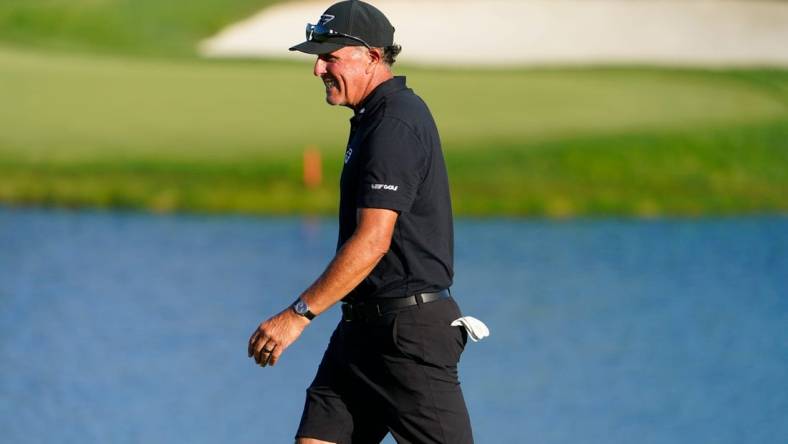 Phil Mickelson reacts to a putt on the 18th green during the final round of the LIV Golf Bedminster golf tournament at Trump National Bedminster on Sunday, Aug. 13, 2023.