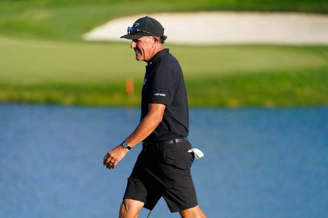 Phil Mickelson reacts to a putt on the 18th green during the final round of the LIV Golf Bedminster golf tournament at Trump National Bedminster on Sunday, Aug. 13, 2023.