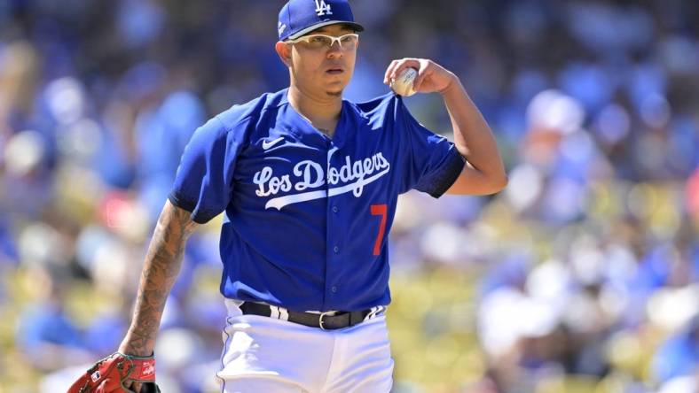 Aug 13, 2023; Los Angeles, California, USA; Los Angeles Dodgers starting pitcher Julio Urias (7) on the mound in the seventh inning against the Colorado Rockies at Dodger Stadium. Mandatory Credit: Jayne Kamin-Oncea-USA TODAY Sports