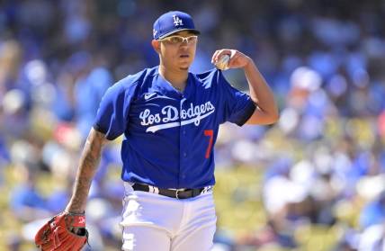 Aug 13, 2023; Los Angeles, California, USA; Los Angeles Dodgers starting pitcher Julio Urias (7) on the mound in the seventh inning against the Colorado Rockies at Dodger Stadium. Mandatory Credit: Jayne Kamin-Oncea-USA TODAY Sports