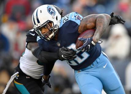 Running back Derrick Henry (22), in action against Jacksonville Jaguars in Nashville on Dec. 31, was the Tennessee Titans' leading rusher for 2017 with 744 yards on 176 carries with 5 rushing touchdowns.
