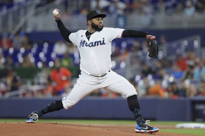 Aug 15, 2023; Miami, Florida, USA;  Miami Marlins starting pitcher Johnny Cueto (47) delivers a pitch against the Houston Astros during the first inning at loanDepot Park. Mandatory Credit: Sam Navarro-USA TODAY Sports