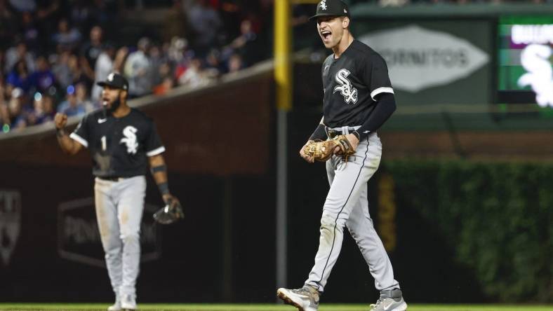 Aug 15, 2023; Chicago, Illinois, USA; Chicago White Sox second baseman Zach Remillard (28) celebrates after tagging out Chicago Cubs second baseman Nico Hoerner at second base during the seventh inning at Wrigley Field. Mandatory Credit: Kamil Krzaczynski-USA TODAY Sports