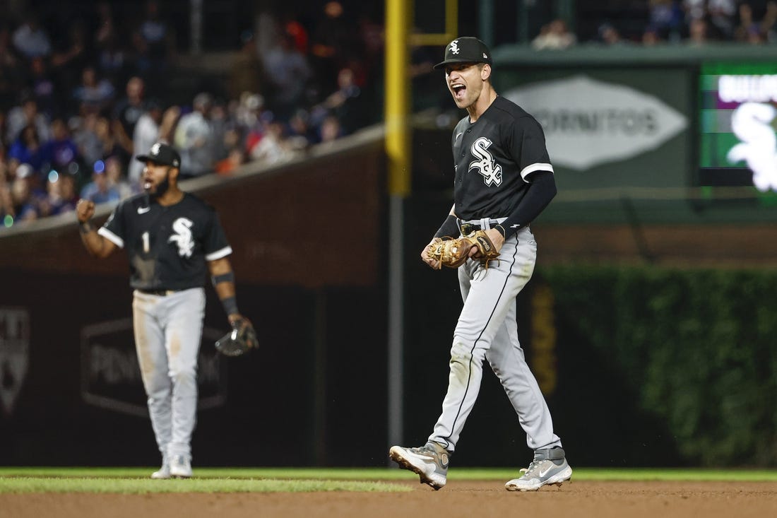 Aug 15, 2023; Chicago, Illinois, USA; Chicago White Sox second baseman Zach Remillard (28) celebrates after tagging out Chicago Cubs second baseman Nico Hoerner at second base during the seventh inning at Wrigley Field. Mandatory Credit: Kamil Krzaczynski-USA TODAY Sports