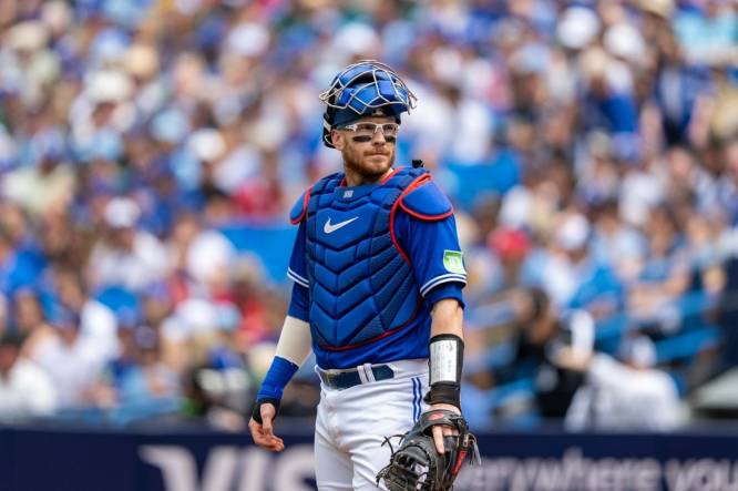 Aug 13, 2023; Toronto, Ontario, CAN; Toronto Blue Jays catcher Danny Jansen (9) looks on against the Chicago Cubs at Rogers Centre. Mandatory Credit: Kevin Sousa-USA TODAY Sports