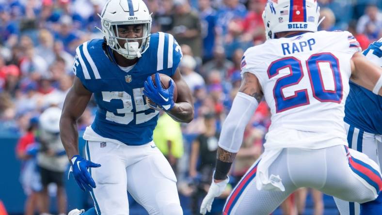 Aug 12, 2023; Orchard Park, New York, USA; Indianapolis Colts running back Deon Jackson (35) against Buffalo Bills safety Taylor Rapp (20) in the first quarter of a pre-season game at Highmark Stadium. Mandatory Credit: Mark Konezny-USA TODAY Sports