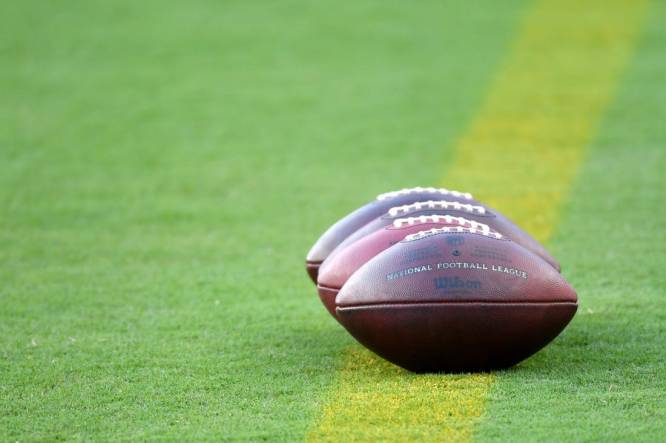 Aug 17, 2023; Philadelphia, Pennsylvania, USA; A general view of footballs on the field during warmups between Philadelphia Eagles and Cleveland Browns at Lincoln Financial Field. Mandatory Credit: Eric Hartline-USA TODAY Sports