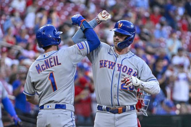 Aug 17, 2023; St. Louis, Missouri, USA;  New York Mets first baseman Pete Alonso (20) celebrates with second baseman Jeff McNeil (1) after hitting a two run home run against the St. Louis Cardinals during the fourth inning at Busch Stadium. Mandatory Credit: Jeff Curry-USA TODAY Sports