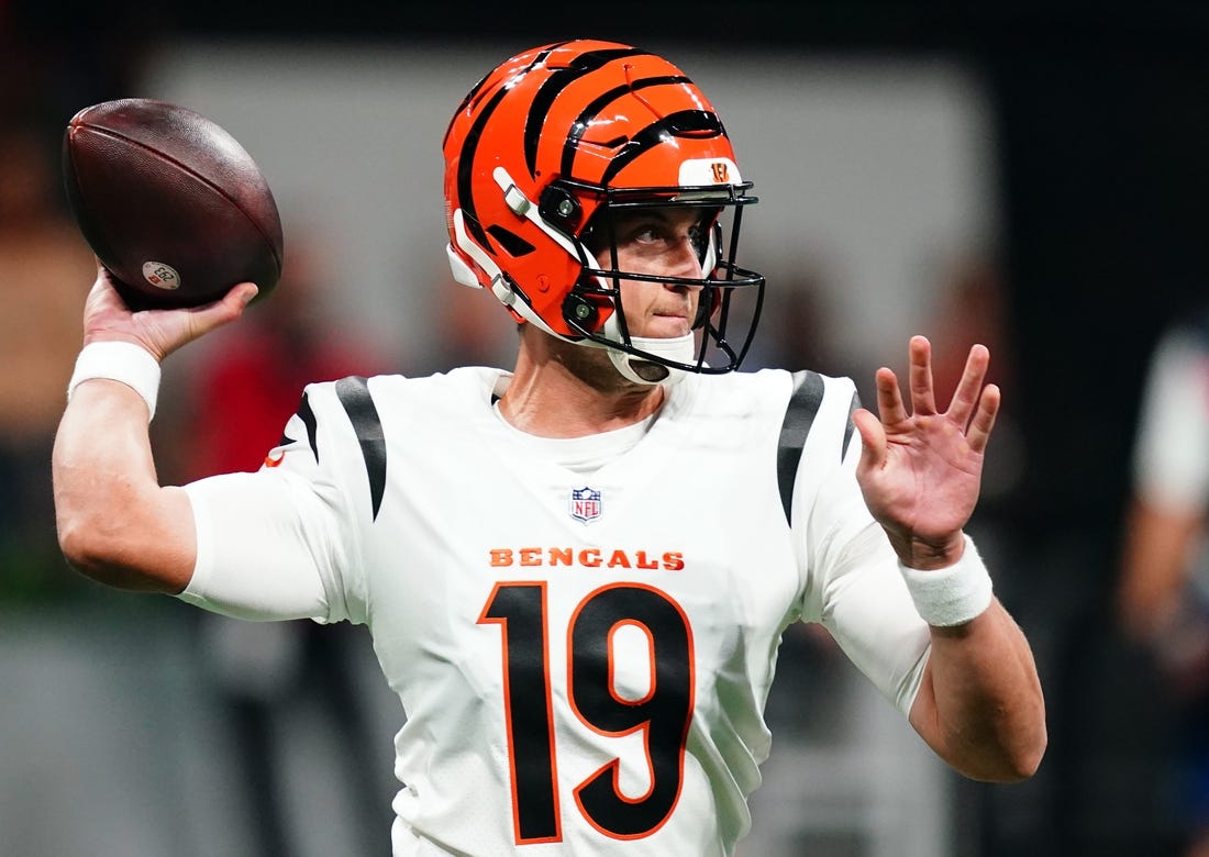 Aug 18, 2023; Atlanta, Georgia, USA; Cincinnati Bengals quarterback Trevor Siemian (19) rolls out to pass against the Atlanta Falcons during the first quarter at Mercedes-Benz Stadium. Mandatory Credit: John David Mercer-USA TODAY Sports