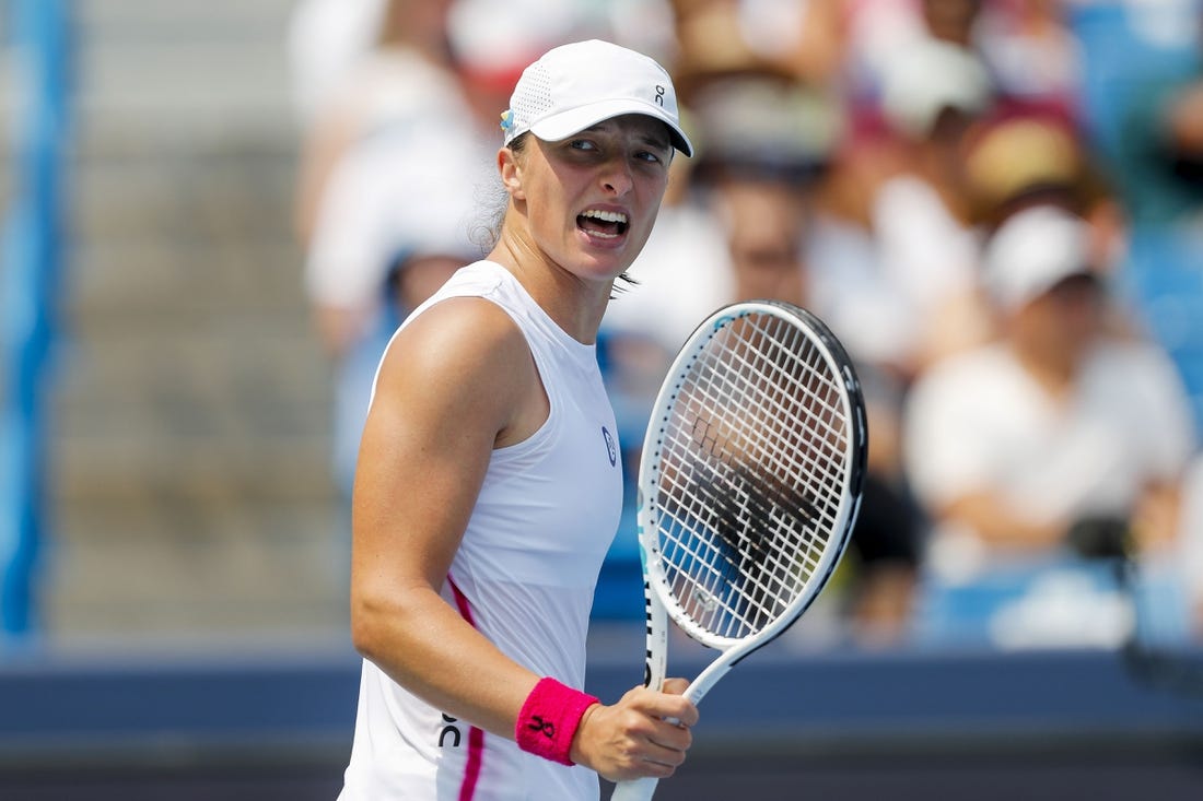 Aug 19, 2023; Mason, OH, USA; Iga Swiatek (POL) reacts after a point against Coco Gauff (USA) during the Western and Southern Open tennis tournament at Lindner Family Tennis Center. Mandatory Credit: Katie Stratman-USA TODAY Sports